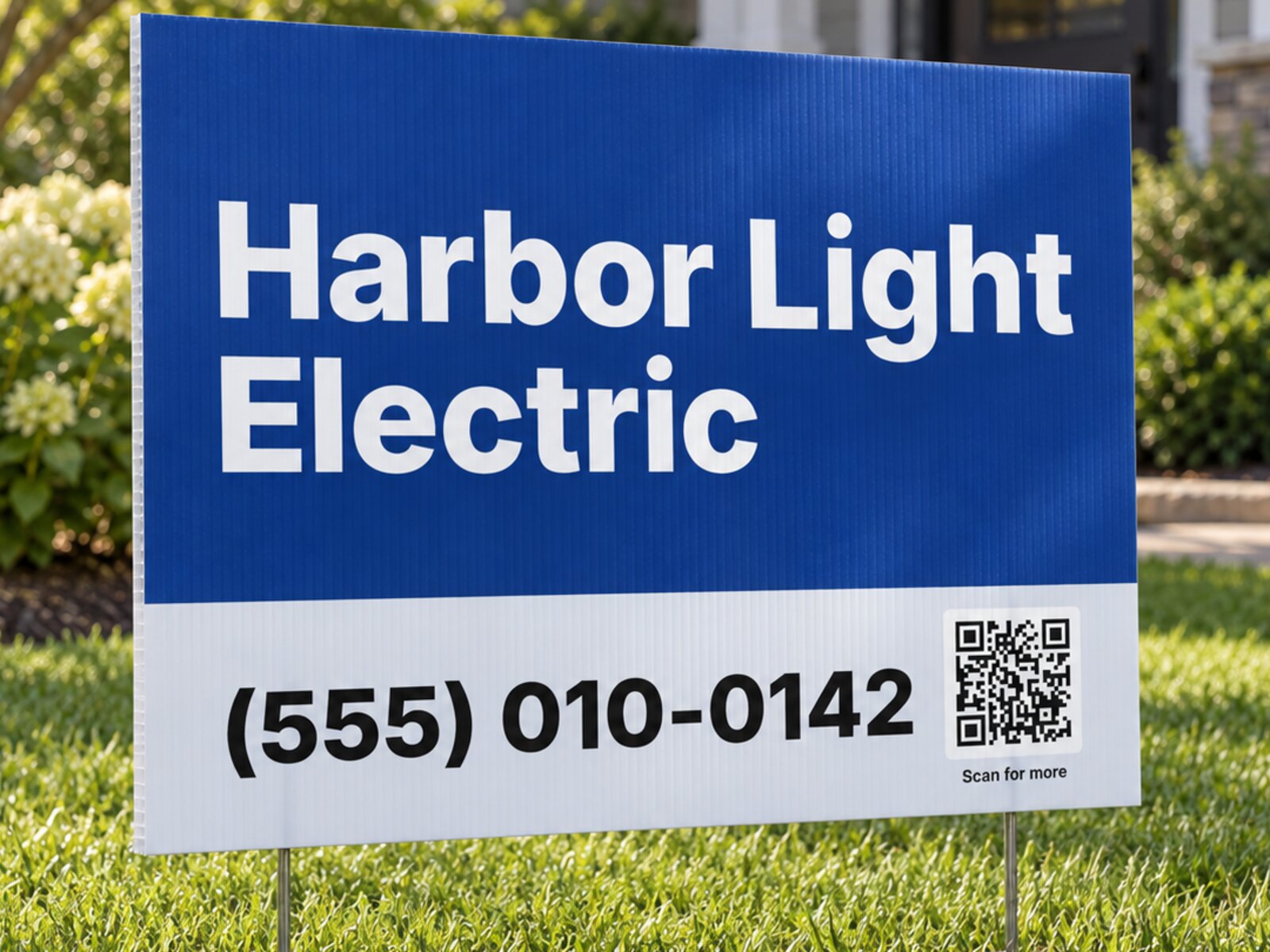 Illustrative Harbor Light Electric coroplast yard sign on a wire stake in a lawn, with its phone number and scan code fully visible